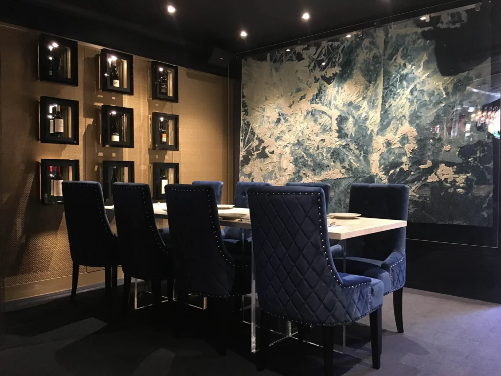 Dining Area, Wine Boxes & Jenny Jones Rug On Wall in Balwyn